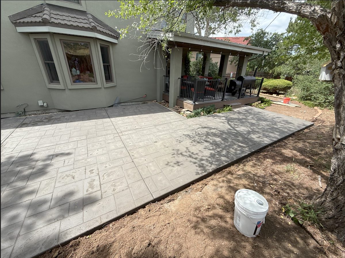 Multi-level concrete patio installation Colorado Springs - tiered design